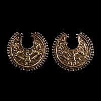 Egypto-Persian Silver-Gilt Earring Pair with Bes Holding Two Ibexes