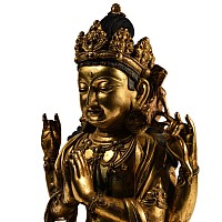 Sino-Tibetan Gilt Bronze Seated Figure of Four-Armed Guanyin