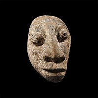 Natural History - Mastodon Bone Face Carving