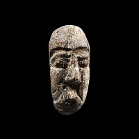 Natural History - Mastodon Bone Face Carving