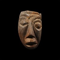 Natural History - Mastodon Bone Face Carving