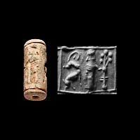 Western Asiatic Glazed Composition Cylinder Seal with Quadrupeds