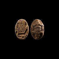 Egyptian Zoomorphic Stone Scaraboid with Animal Heads and Hieroglyphs