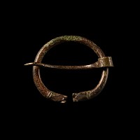 Viking Age Bronze Torc-Shaped Brooch with Beast Heads
