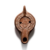 Late Roman Redware Oil Lamp With Daniel Standing