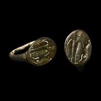 Hellenistic Bronze Ring with Lion Attacking a Warrior