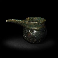 Luristan Bronze Spouted Vessel with Attacking Bulls