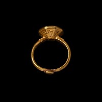Medieval Gold Signet Ring with Hexagonal Bezel Engraved with an Arabic Inscription