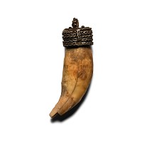 Viking Age Silver Pendant with Bear's Tooth