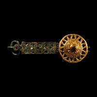 Merovingian Bronze Harness Buckle with Gold and Garnet Inlays