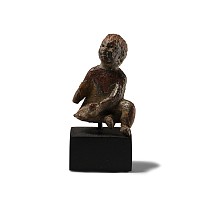 Roman Bronze Seated Child Statuette