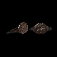 Tudor Period Bronze Ring with Hexagonal Bezel and Armorial Motif