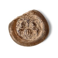 Late Roman Glass Pendant with Rearing Lions
