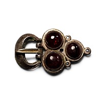 Merovingian Silver Buckle with Garnet Cabochons