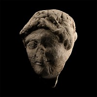 Cypriot Head of a Youth with a Floral Crown