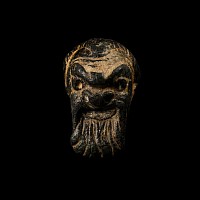 Graeco-Roman Bronze Appliqué in the Shape of an Actor's Mask