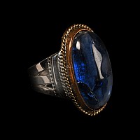 Large Silver-Coloured Metal Ring with Blue Glass Cabochon