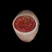 Large Western Asiatic Silver-Coloured Metal Ring with Calligraphic Gemstone