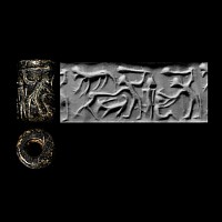Anatolian Black Stone Cylinder Seal with Figures Holding Clubs