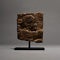 Assyrian Gypsum Relief with Head of a Bearded Man