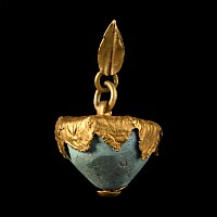 Large Western Asiatic Gold Framed Turquoise Bead