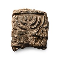 Late Roman Lead Tessera with Menorah and Inscription