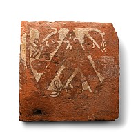 Large Medieval Heraldic Tile with the Heads of Three Africans within a Shield