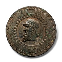 Parthian Bronze Medallion with a Bearded Man