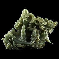 Chinese Bifacial Green Stone Carving of a Dragon Attacking a Boat
