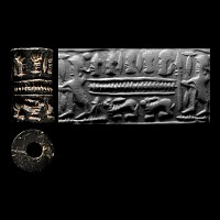 Syrian Black Stone Cylinder Seal with Heads and Animals
