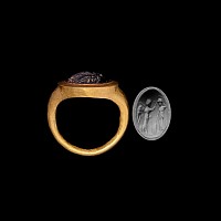 Roman Gold Ring with Cabochon Garnet Gemstone with the Goddesses Athena and Nike