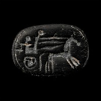 Western Asiatic Black Stone Scaraboid with Charioteer
