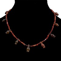 Egyptian Carnelian Bead and Poppy Amulet Necklace