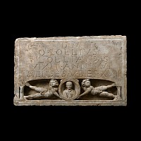 Roman Limestone Stele with Nude Putti