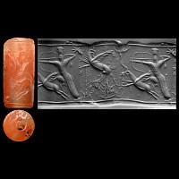Western Asiatic Orange Carnelian Cylinder Seal with Hunting Scene