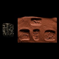 Mesopotamian Black Stone Four-Sided Seal with Heads and Animals