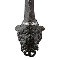 Roman Bronze Vessel Handle with Silver Inlaid Face