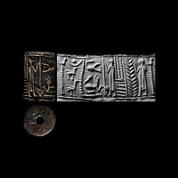 'The Ada Moore' Syrian Black Stone Cylinder Seal with Standing Figure and Scorpion