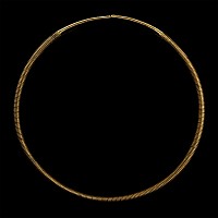 Scythian Gold-Clad Ribbed Torc with Decorated Terminals