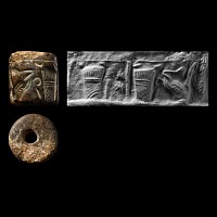 Neo-Assyrian Brown Steatite Cylinder Seal with a Dog