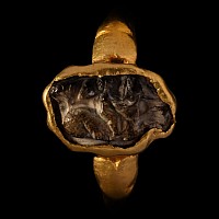 Roman Gold Ring with Burnt Agate Cameo of Eros, the Greek God of Love Riding a Hippocampus