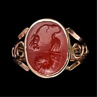 Roman Carnelian Gemstone with Stork Emerging from a Seashell in Gold Ring
