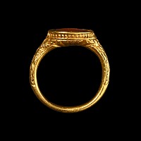 Renaissance Gold Ring with Carnelian Gemstone of a Resting Hero