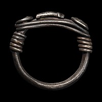 Central Balkans Silver Ring with Spiralled Terminals and Axe Motif Ornament