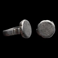 Large Western Asiatic Silver Ring with Floral Design