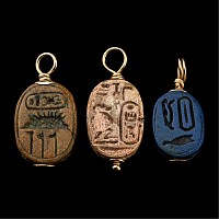 Egyptian Faience Scarabs with Gold Mounts