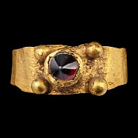 Roman Gold Ring with Conical Ruby-Coloured Gem