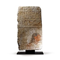 Egyptian Limestone Relief with Painted Head and Hieroglyphics