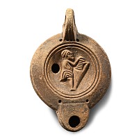 Roman Terracotta Oil Lamp with Figure Carrying an Amphora