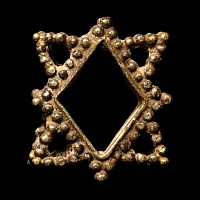 Western Asiatic Gold Star-Shaped Necklace Element